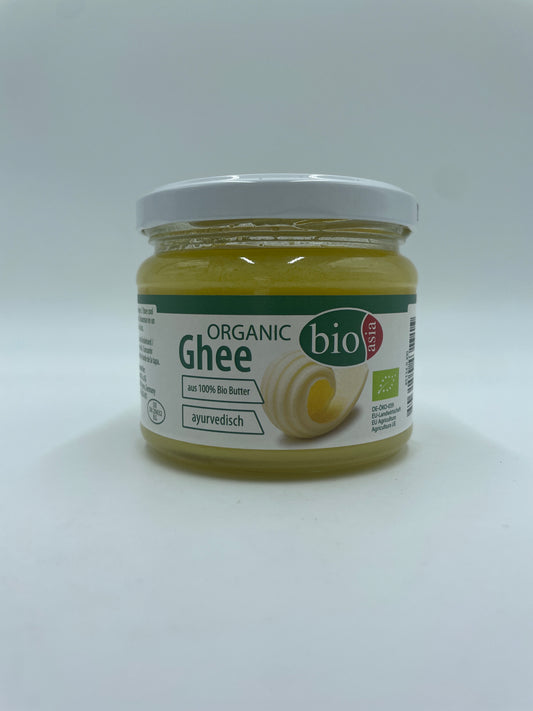 Økologisk BIO ASIA Ghee smør i olieform, vises i billedet med gylden farve og glat tekstur