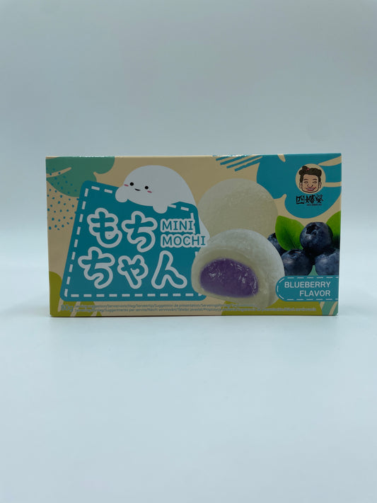 Mini Mochi snacks med blåbærsmag fra SZU SHEN PO, vises i denne billed. Blå, rund og chewy konsistens.